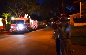 Briar Creek residents wave to Santa aboard a SHFD fire engine Friday night.