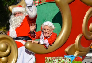 Mr. and Mrs. Claus enjoy a sleigh ride during the 2013 Safety Harbor Holiday parade on Saturday.