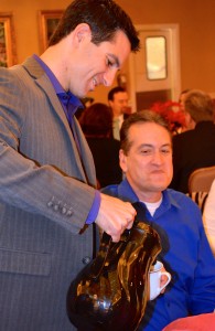 Safety Harbor Mayor Joe Ayoub serves coffee during the annual Mayor's Breakfast on Friday.