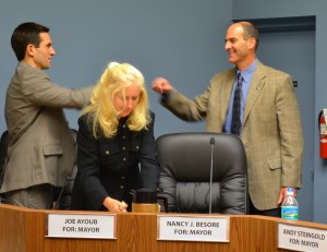 Safety Harbor Mayoral candidates Joe Ayoub and Andy Steingold share a fist bump following the candidate forum on Wednesday.