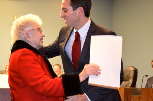Safety Harbor Mayor Joe Ayoub receives a hug from local centenarian Jeanne Frymire.