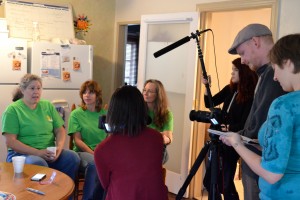 Harbor Dish officials Lesliee Antonnette (L) and Chris Sauger (r) are interviewed by students from Countryside High School's media lab.