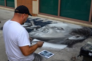 West Palm Beach based artist Dave Lepore puts the finishing touches on his prize-winning piece.