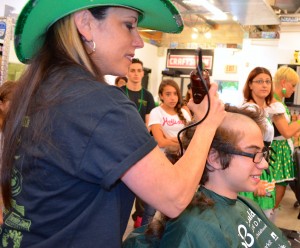 12-year-old Shane Gemma raised nearly $1,300 to shave his head.