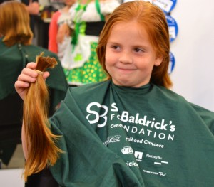 7-year-old Brooke Beatty raised nearly $600 to cut her hair for charity Saturday.