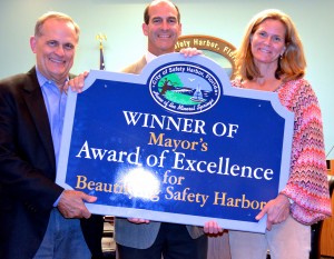 Spring 2014 Mayor's Award of Excellence winers Peter Monroe and Melissa Haist pose with Mayor Andy Steingold.