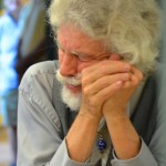 Lois Spencer's son, Karl Falen, listens to the tributes to his mom.