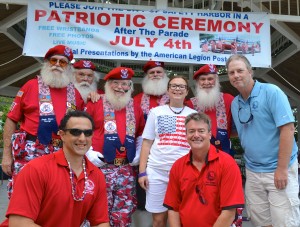 Safety Harbor City Commissioners Carlos Diaz, Cliff Merz and Andy Zodrow pose with Santa's Drill Team.