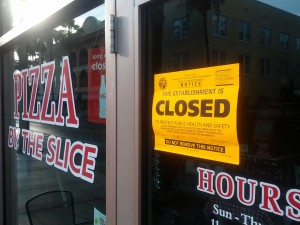 According to a sign on the wiondow, the Safety Harbor Pizzeria has been closed in order "to protect public health and safety."