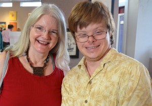 Harborside Studios artist Tyler C. with his mom, Michelle Larson.