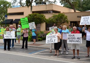 A large group of protesters gathered at Safety Harbor City Hall for the tree ordinance workshop Monday night.