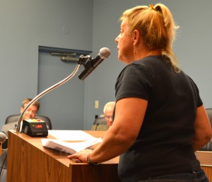Safety Harbor resident Sue Zinkel speaks about the trees to the City Commission on Monday.