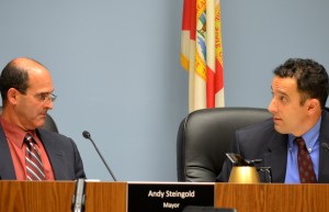 Mayor Andy Steingold and Commissioner Carlos Diaz discuss the tree ordinance.