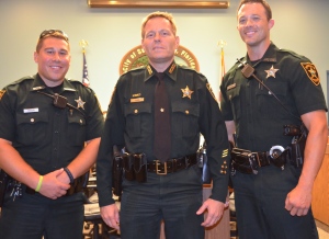 PCSO Deputies Joel Morgan (L) and Nick Hammack (R) with Captain Glenn Luben.