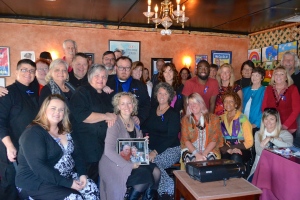 Janet Lee Stinson (seated w/ photo) recently hosted a brunch at Cello's Charhouse in order to drum up interest in her screenplay project.