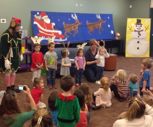 Laura Dent plays Spencer the Elf at the Safety harbor Library's holiday story time this year. Credit: SHPL