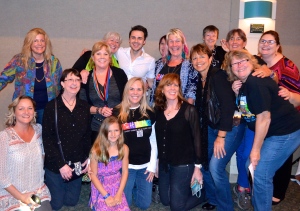 American Idol winner Kris Allen poses with a crowd after his SHAMc benefit show at Ruth Eckerd Hall Friday night.