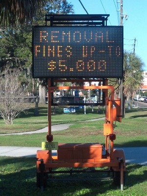 tree removal fine sign