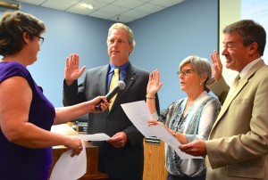 Commissioners Andy Zodrow, Janet Hooper and Cliff Merz were sworn in on Monday night.