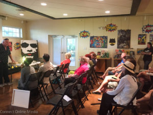 Safety Harbor artist Dino Kotopoulis presents his public art project proposal at the Safety harbor Museum and Cultural Center on Monday night. 