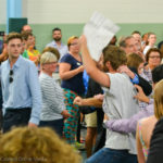 A protestor was escorted out of the building during Bill Clinton's speech on Tuesday.