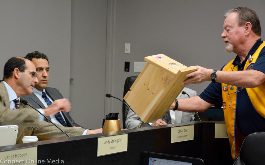 Lions Club of Safety Harbor president John Breznai shows one of the bat houses to the City Commission on Monday, feb. 6, 2017.